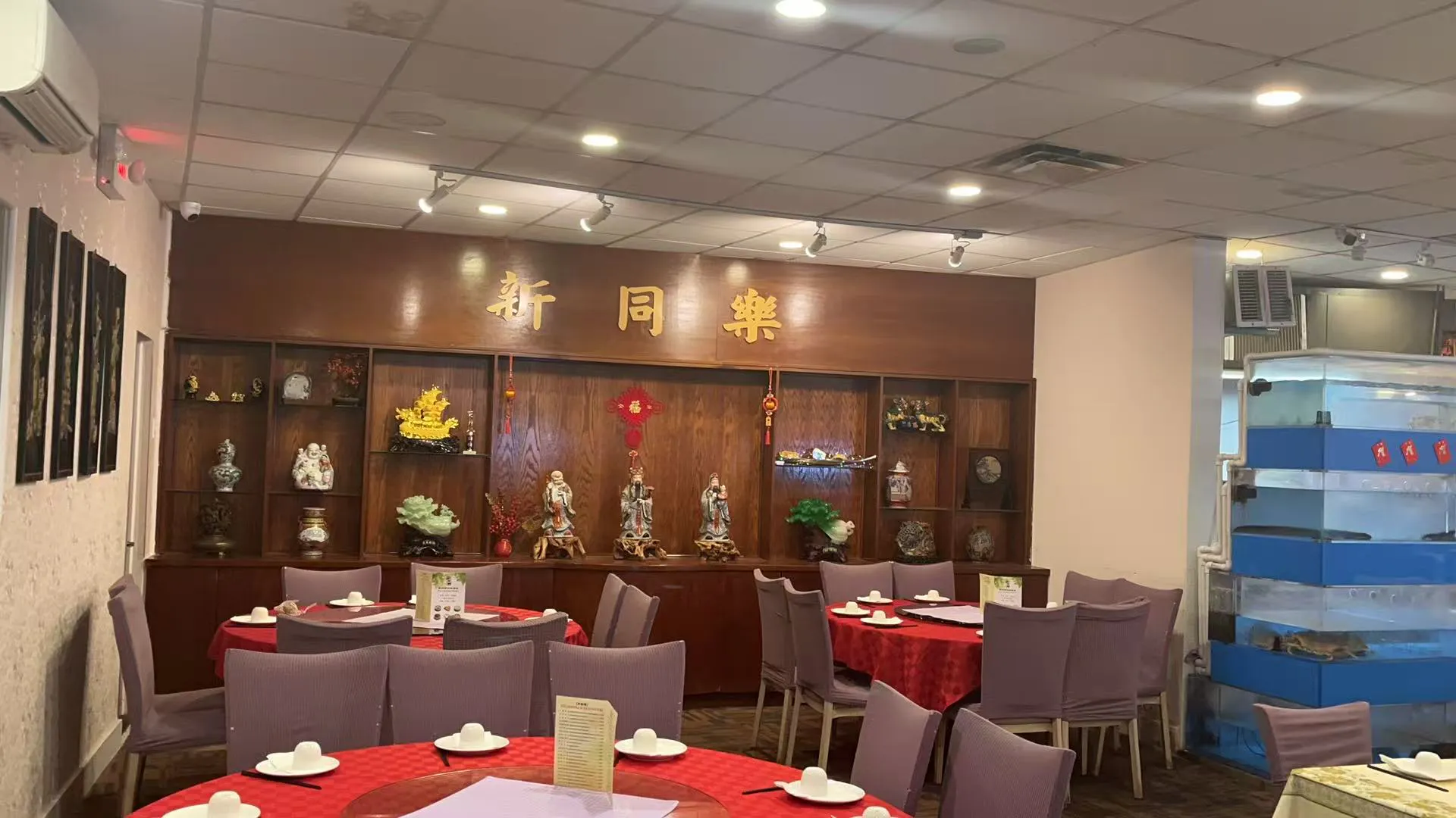 Elegant restaurant interior with New Northern Manor sign and decor at New Northern Manor, a Chinese Restaurant in Queens Elegant restaurant interior with New Northern Manor sign and decor at New Northern Manor, a Chinese Restaurant in Queens